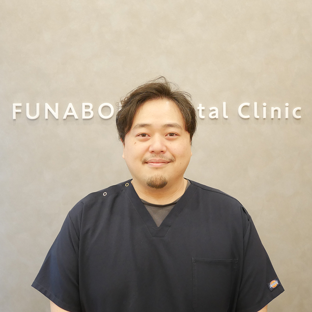 歯科医師の土持先生